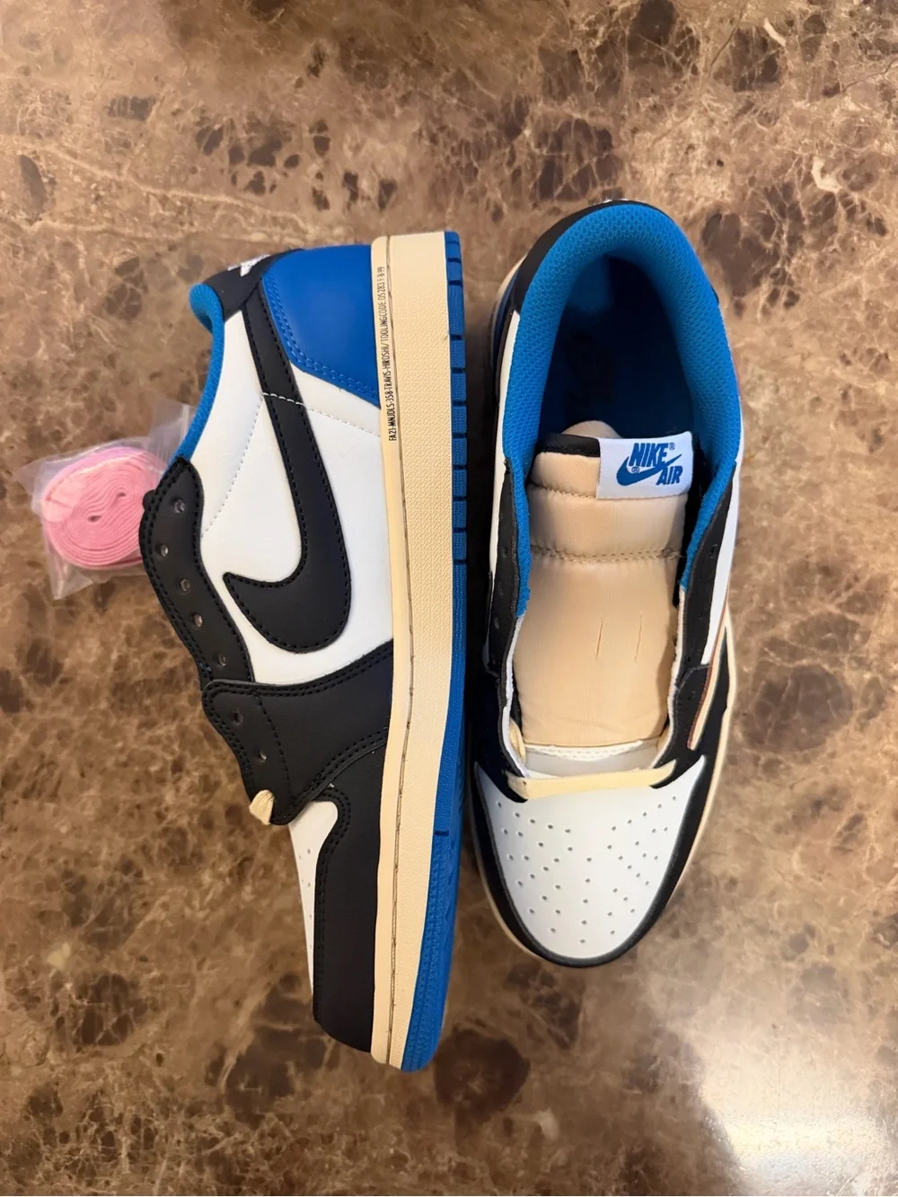 Jordan 1s Low Fragments x Travis Scott’s  DS with box and extra pink laces